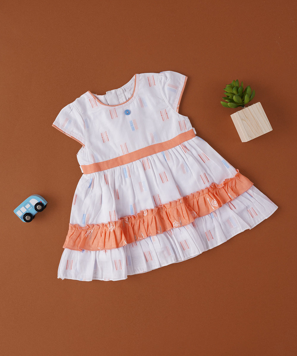 🍊 White & Orange Baby Frock with Ruffle Layers – Breezy Cotton Comfort