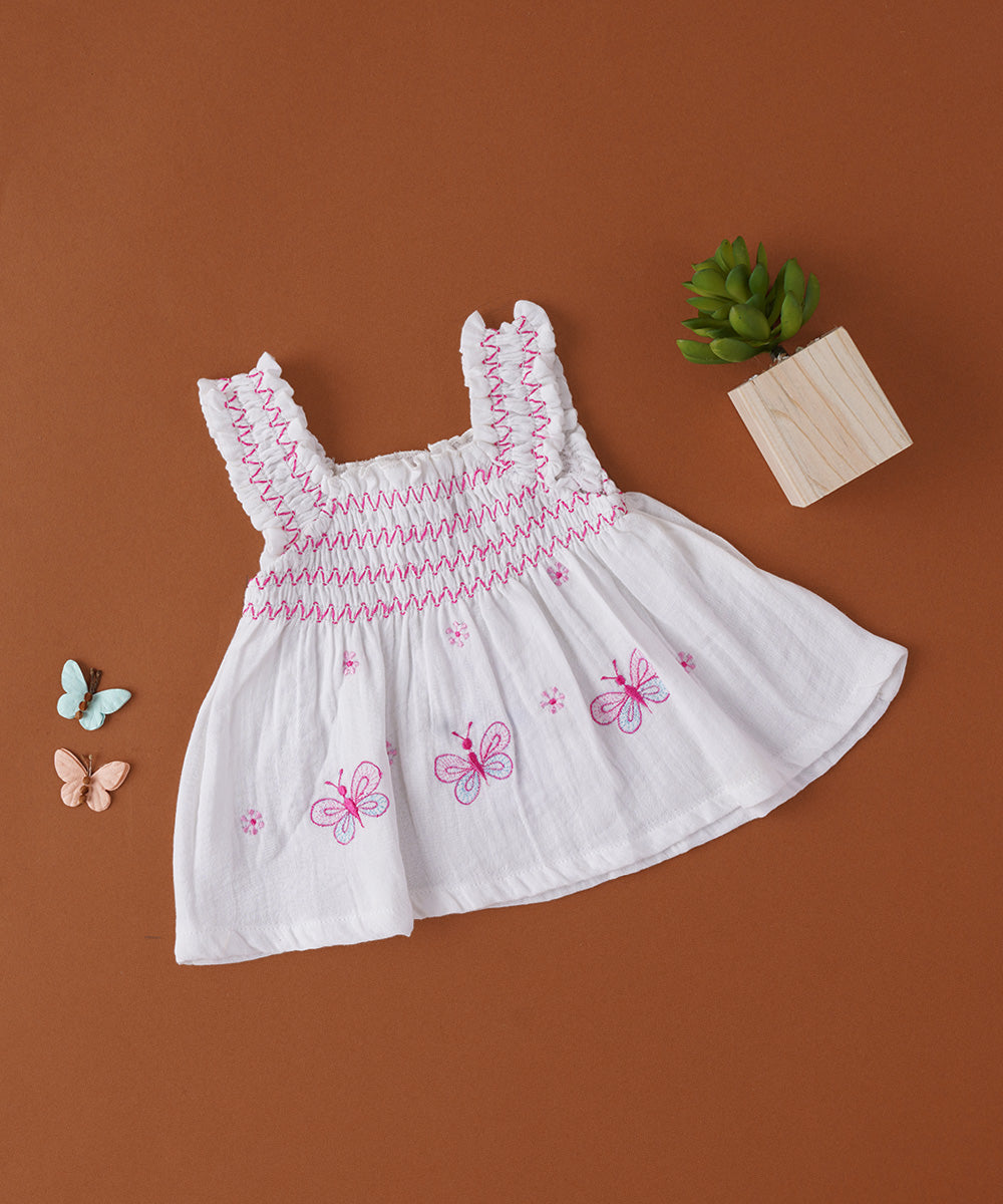 🦋 White Muslin Butterfly Embroidered Baby Frock with Smocked Ruffle Straps