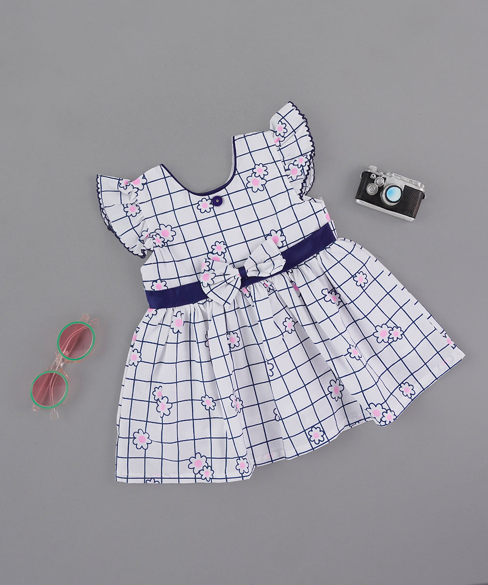 🌸 White & Navy Blue Checked Frock with Pink Floral Accents & Bow