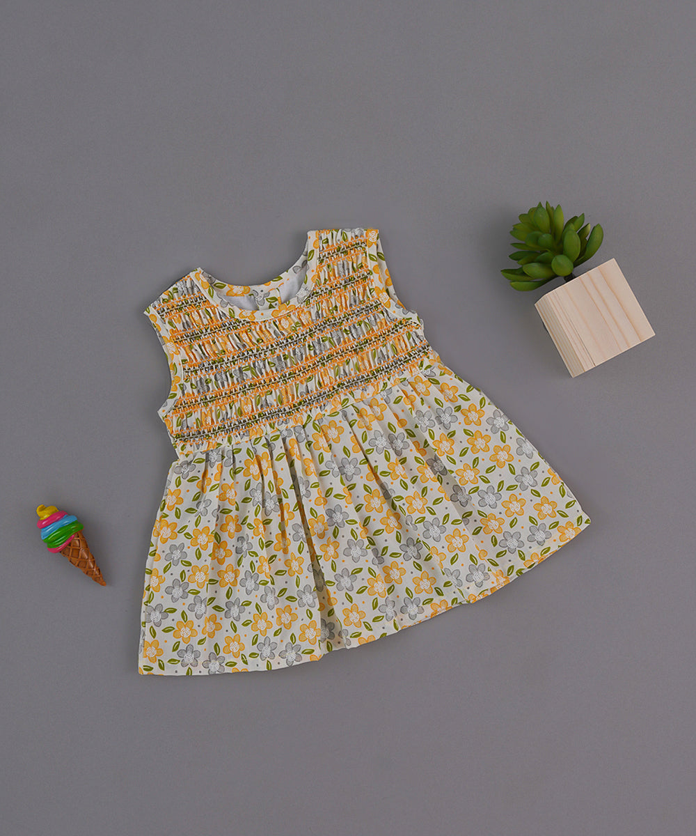 Yellow Floral Smocked Cotton Frock – Sleeveless Summer Dress