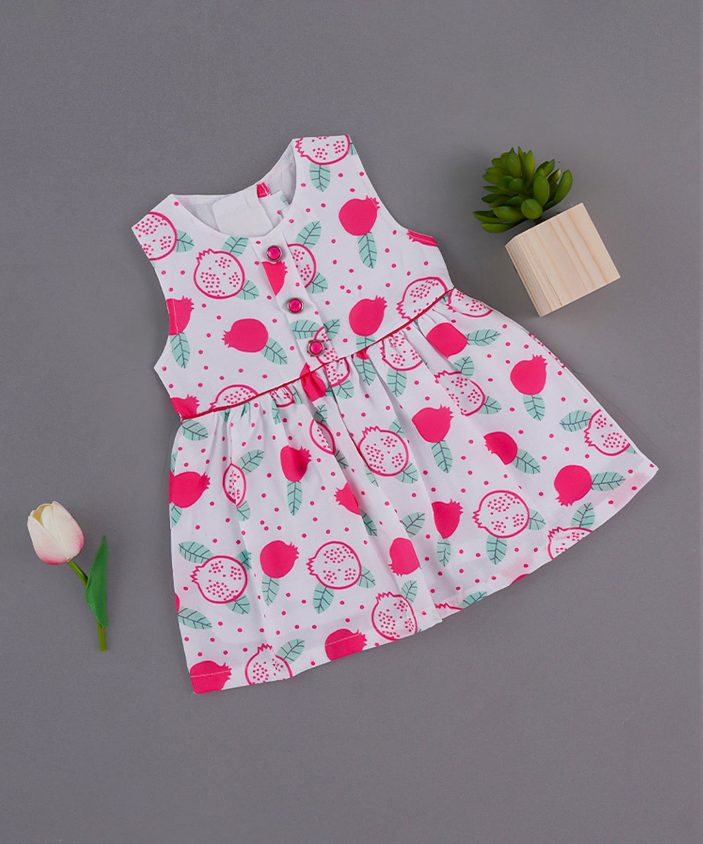 White Sleeveless Baby Frock with Pomegranate Print & Button Detail